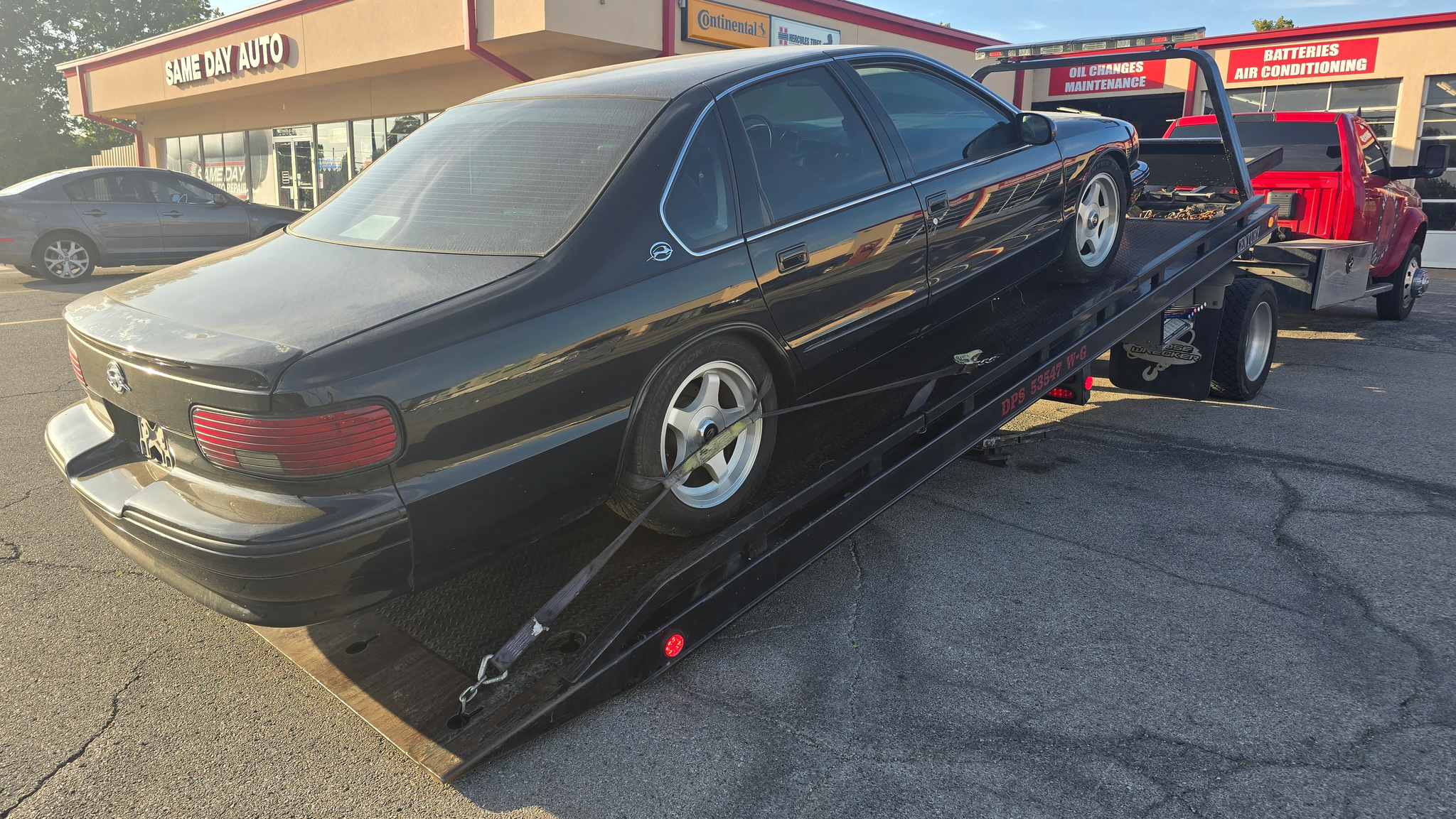 Tow truck responding to car breakdown in Jenks OK